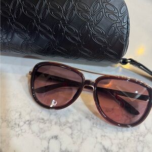 Oakley Burgundy Sunglasses with Black Case
